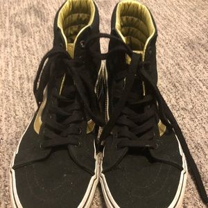 Black and gold high top vans